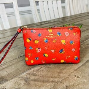 Coach Corner Zip Wristlet “Mini Vintage Rose Print" Clutch
